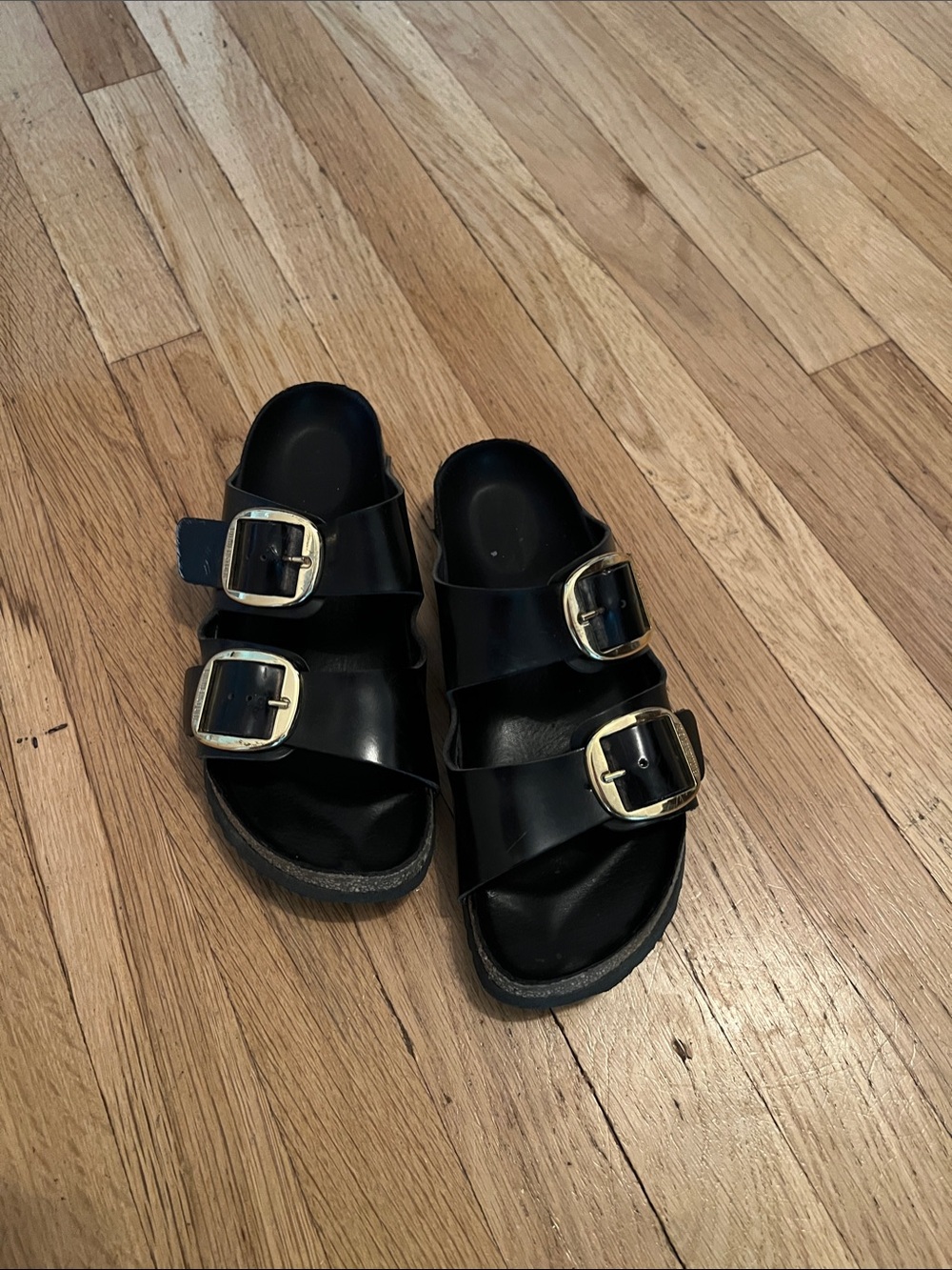 Women’s Black Birkenstocks with Gold Buckles